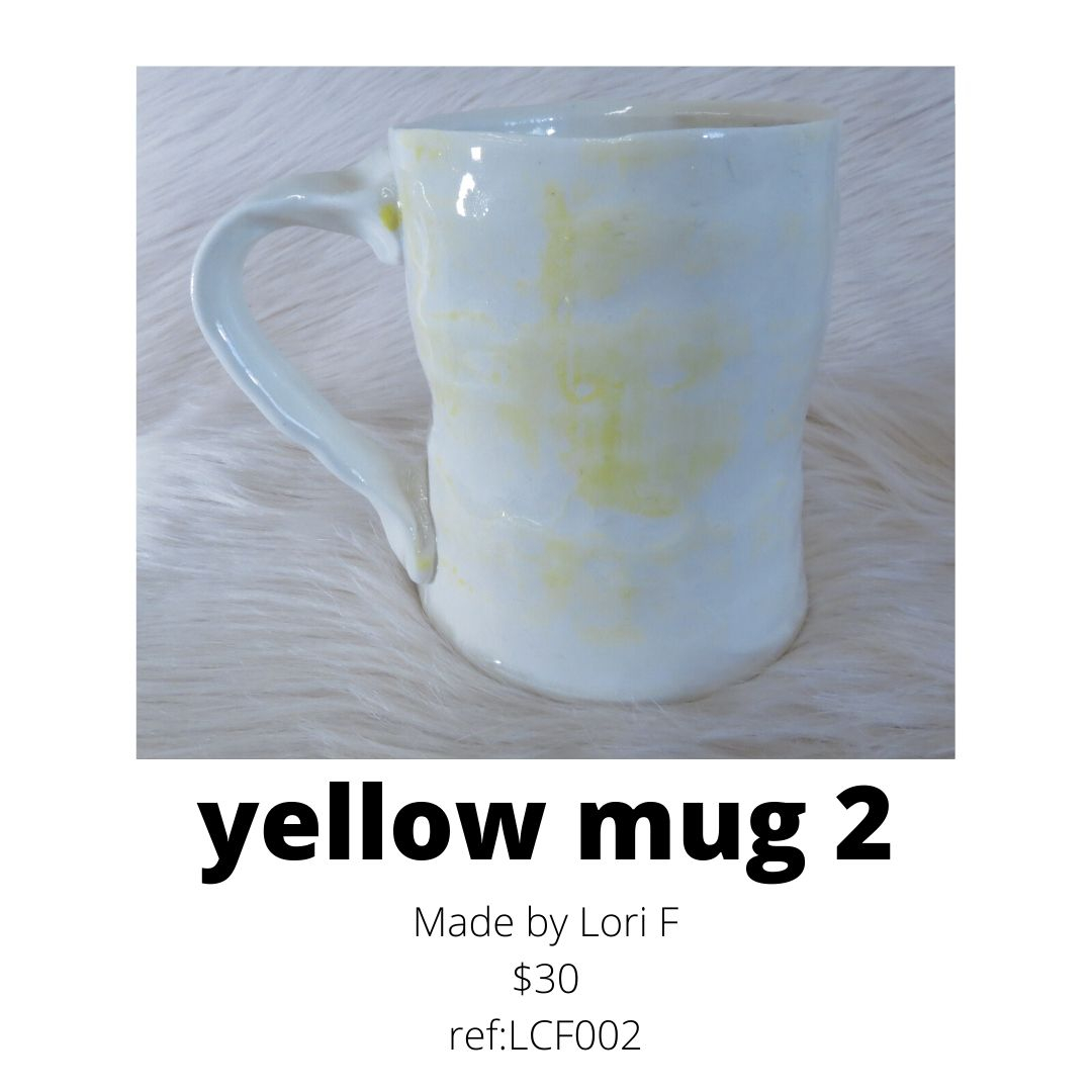 Lori white and yellow mug for sale