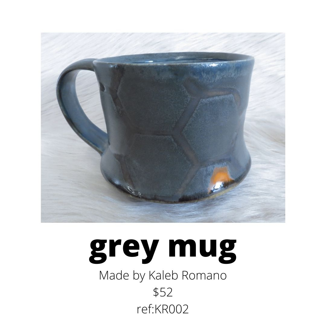grey mug by Kaleb